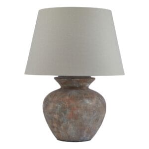 Topped with a neutral linen lampshade, the Siena Brown Round Table Lamp emits a soft, ambient glow, perfect for creating a cosy and inviting atmosphere in living rooms, bedrooms, or elegant hallway settings. Its earthy tones and classic silhouette make it a versatile piece that adds depth and warmth to any décor.