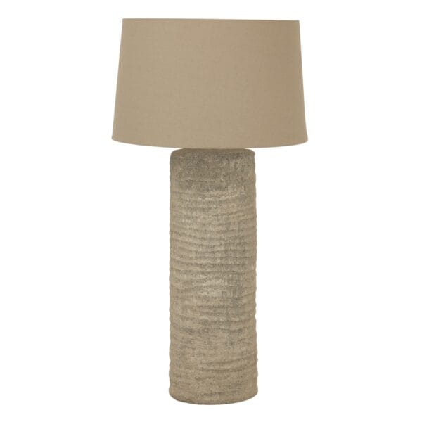 Topped with a neutral linen lampshade, the Tall Tuscan Grey Lamp emits a soft, ambient glow, creating a warm and inviting atmosphere in living rooms, bedrooms, or sophisticated office spaces. The subtle texture and muted grey tones ensure it seamlessly complements a wide range of interior styles, adding depth and warmth to any space.