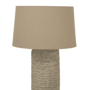 Topped with a neutral linen lampshade, the Tall Tuscan Grey Lamp emits a soft, ambient glow, creating a warm and inviting atmosphere in living rooms, bedrooms, or sophisticated office spaces. The subtle texture and muted grey tones ensure it seamlessly complements a wide range of interior styles, adding depth and warmth to any space.