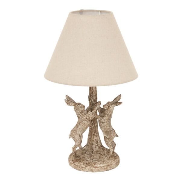 The Stonewashed Marching Hares Lamp with Linen Shade is a beautifully crafted lighting piece, blending rustic charm with whimsical elegance. Featuring a unique stonewashed finish and an intricate marching hares design, this lamp is perfect for traditional, country-style, and eclectic interiors. The neutral linen shade casts a soft and warm glow, making it an ideal accent lamp for cosy living rooms, bedrooms, or entryways. The subtle yet eye-catching hare motif adds character, making this lamp a perfect conversation piece. Ideal for those who appreciate nature-inspired décor, the Stonewashed Marching Hares Lamp is a timeless and sophisticated addition to any home.
