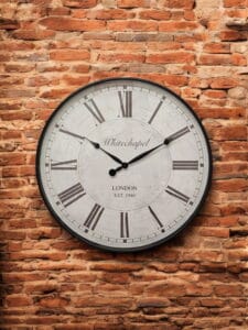 Antique style wall clock with Roman numerals and glass front, 50cm, adding classic charm to any room